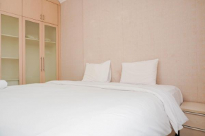 Homey and Compact 2BR Mediterania Marina Ancol Apartment By Travelio